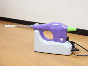 歯科用電動注射器